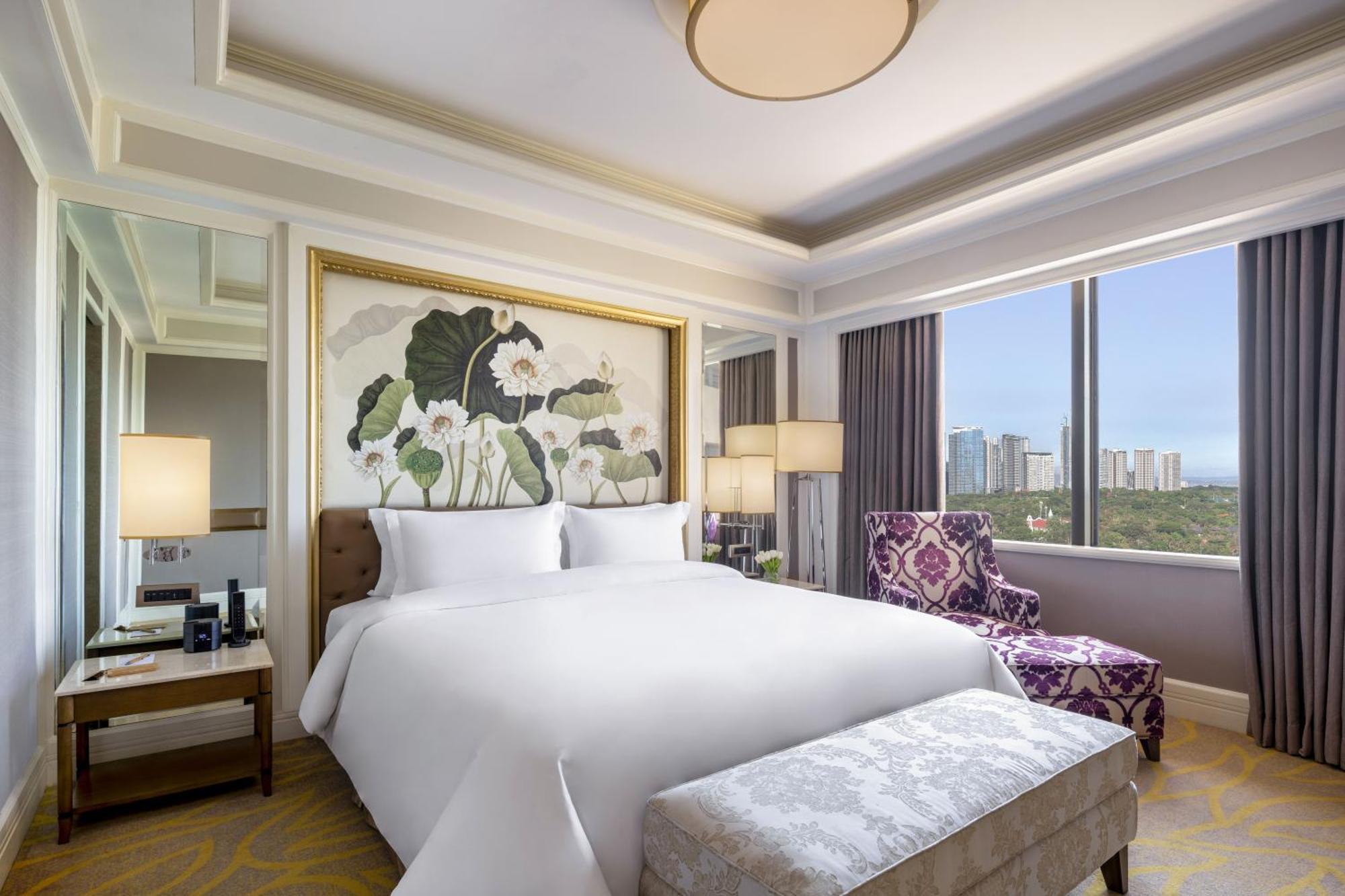 Dusit Thani Manila Makati City Quarto foto A bedroom at the hotel