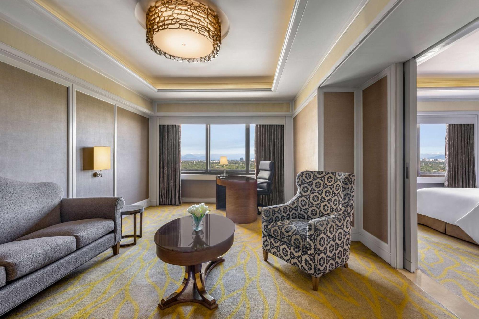 Dusit Thani Manila Makati City Exterior foto A suite at the hotel